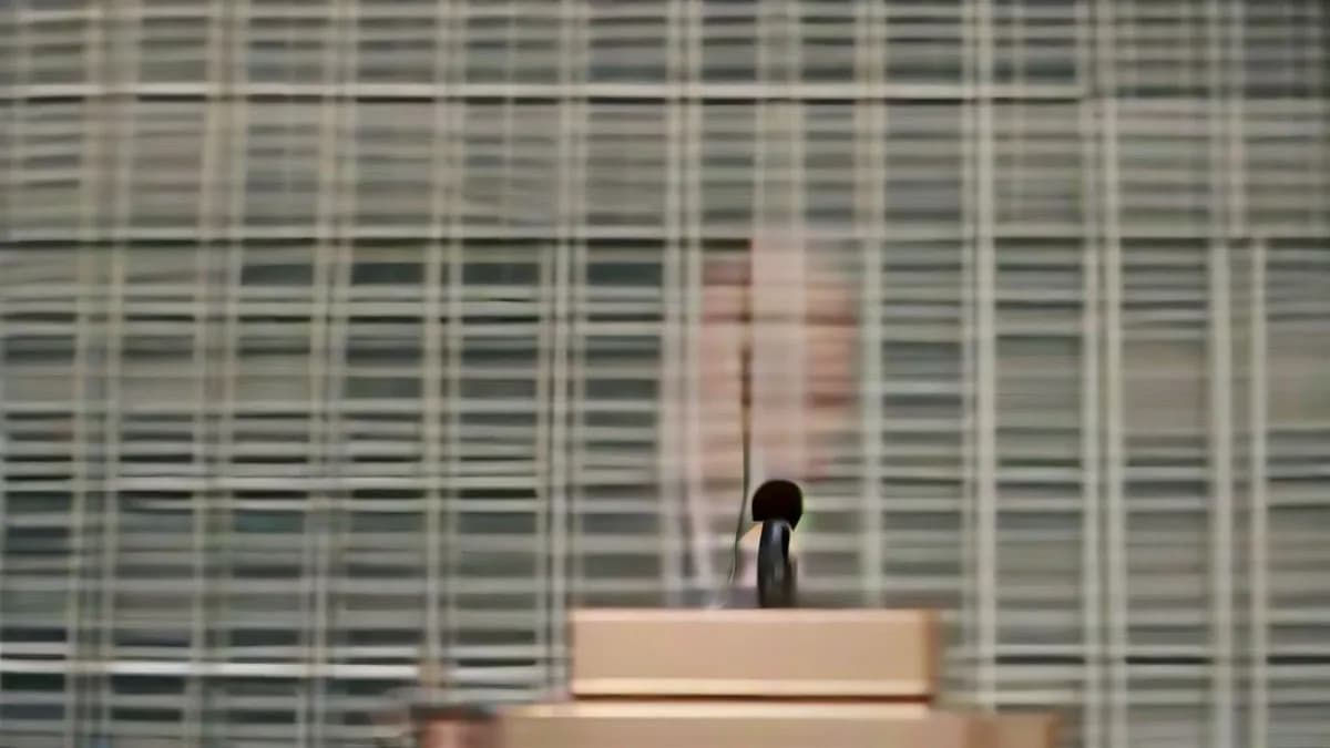 French President Emmanuel Macron speaking at a press conference regarding domestic unrest.